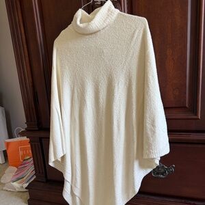 Soft white turtleneck poncho